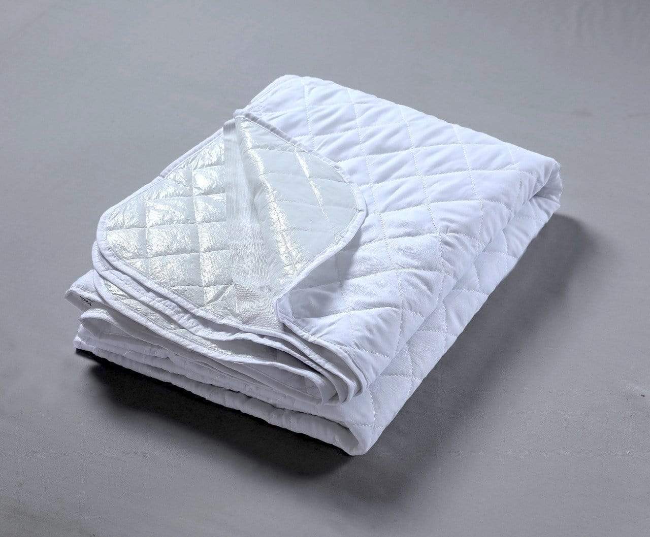 Olivia Rocco Quilted Mattress Protector with Waterproof Reverse