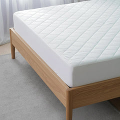 Olivia Rocco Quilted Mattress Protector with Waterproof Reverse
